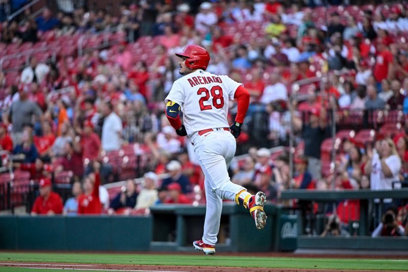 Aug 15, 2023; St. Louis, Missouri, USA;  St. Louis Cardinals third baseman Nolan Arenado (28) runs down the line after hitting a two run home run against the Oakland Athletics during the first inning at Busch Stadium. Mandatory Credit: Jeff Curry-USA TODAY Sports