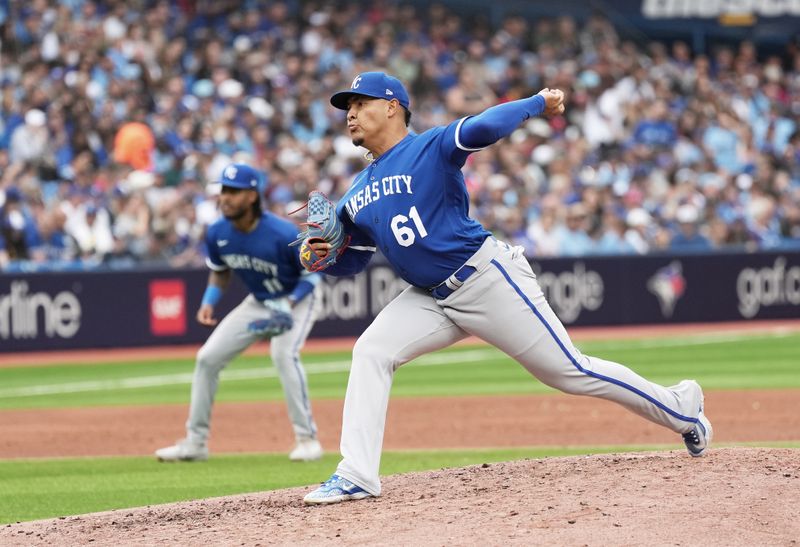 Sep 9, 2023; Toronto, Ontario, CAN; Kansas City Royals relief pitcher Angel Zerpa (61) pitches against the Toronto Blue Jays during the sixth inning at Rogers Centre. Mandatory Credit: Nick Turchiaro-USA TODAY Sports