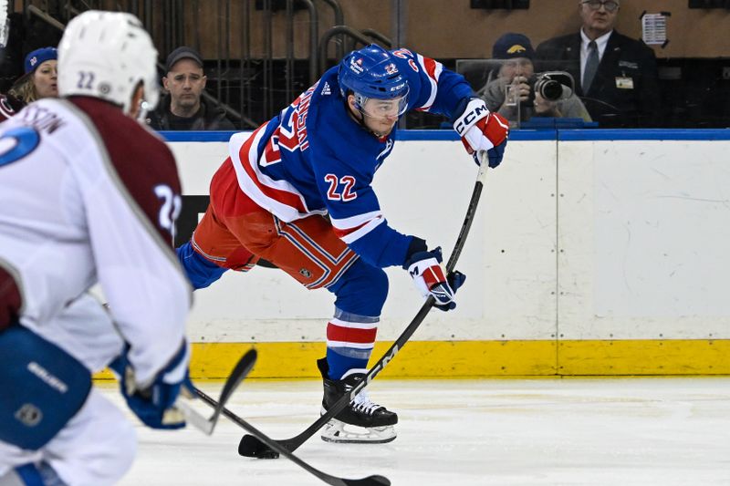 Feb 5, 2024; New York, New York, USA;  New York Rangers center Jonny Brodzinski (22) attempts a shot against the Colorado Avalanche during the first period at Madison Square Garden. Mandatory Credit: Dennis Schneidler-USA TODAY Sports