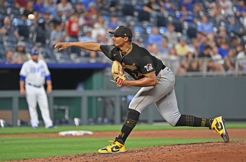 Aug 28, 2023; Kansas City, Missouri, USA;  Pittsburgh Pirates starting pitcher Johan Oviedo (24) delivers a pitch in the seventh inning against the Kansas City Royals at Kauffman Stadium. Mandatory Credit: Peter Aiken-USA TODAY Sports