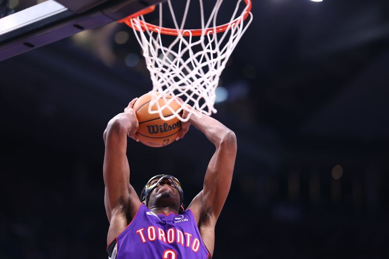 TORONTO, CANADA - APRIL 3:   Jonathan Mogbo #2 of the Toronto Raptors dunks the ball during the game against the Portland Trail Blazers   on April 3, 2025 at the Scotiabank Arena in Toronto, Ontario, Canada.  NOTE TO USER: User expressly acknowledges and agrees that, by downloading and or using this Photograph, user is consenting to the terms and conditions of the Getty Images License Agreement.  Mandatory Copyright Notice: Copyright 2025 NBAE (Photo by Vaughn Ridley/NBAE via Getty Images)