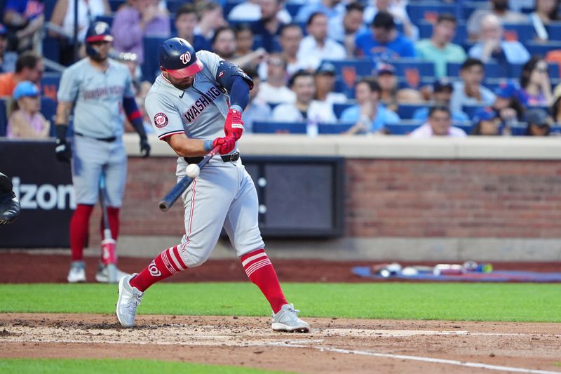 Jul 10, 2024; New York City, New York, USA; Washington Nationals first baseman Juan Yepez (18) hits a single against the New York Mets during the fourth inning at Citi Field. Mandatory Credit: Gregory Fisher-USA TODAY Sports