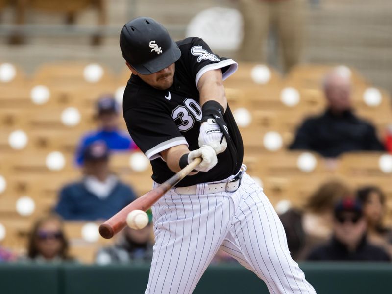 Mar 1, 2023; Phoenix, Arizona, USA; Chicago White Sox first baseman Jake Burger against the Cleveland Guardians during a spring training game at Camelback Ranch-Glendale. Mandatory Credit: Mark J. Rebilas-USA TODAY Sports