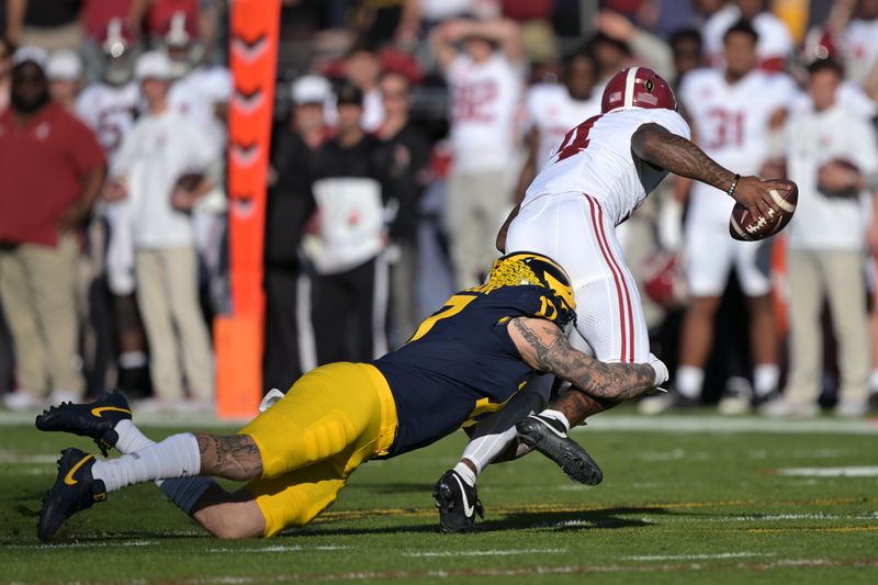 Jan 1, 2024; Pasadena, CA, USA; Alabama Crimson Tide quarterback Jalen Milroe (4) is sacked by Michigan Wolverines defensive end Braiden McGregor (17) during the first half in the 2024 Rose Bowl college football playoff semifinal game at Rose Bowl. Mandatory Credit: Jayne Kamin-Oncea-USA TODAY Sports