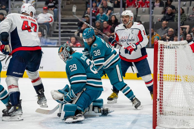 Nov 27, 2023; San Jose, California, USA; San Jose Sharks goaltender Mackenzie Blackwood (29) makes a save against Washington Capitals left wing Beck Malenstyn (47) during the third period at SAP Center at San Jose. Mandatory Credit: Neville E. Guard-USA TODAY Sports