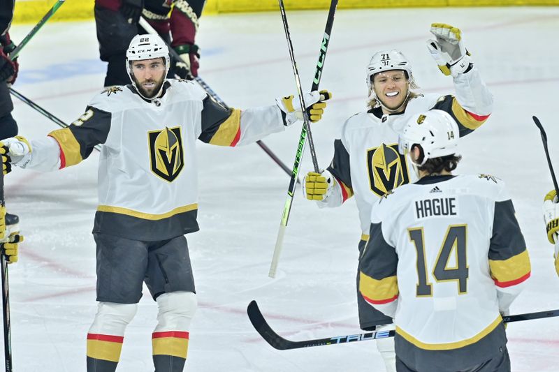 Feb 8, 2024; Tempe, Arizona, USA; Vegas Golden Knights defenseman Nicolas Hague (14) celebrates with right wing Michael Amadio (22) and center William Karlsson (71) after scoring a goal in the first period against the Arizona Coyotes at Mullett Arena. Mandatory Credit: Matt Kartozian-USA TODAY Sports