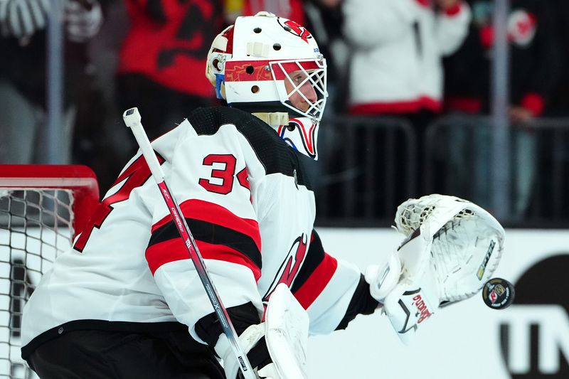 Mar 17, 2024; Las Vegas, Nevada, USA; New Jersey Devils goaltender Jake Allen (34) warms up before a game against the Vegas Golden Knights at T-Mobile Arena. Mandatory Credit: Stephen R. Sylvanie-USA TODAY Sports