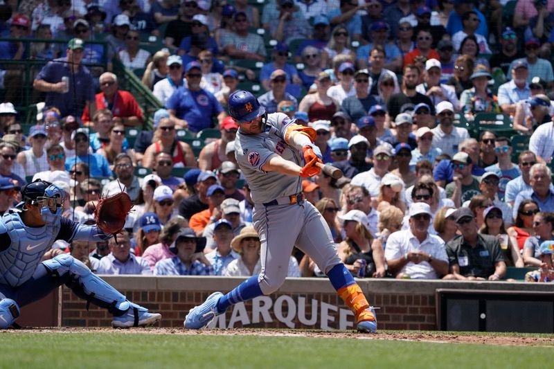 Jun 21, 2024; Chicago, Illinois, USA; New York Mets first baseman Pete Alonso (20) hits a double against the Chicago Cubs during the third inning at Wrigley Field. Mandatory Credit: David Banks-USA TODAY Sports