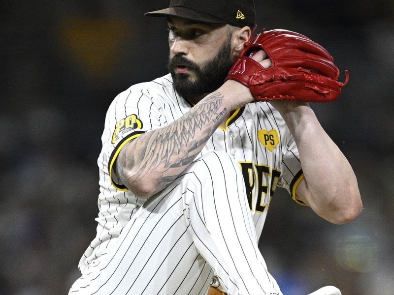 Aug 13, 2024; San Diego, California, USA; San Diego Padres relief pitcher Tanner Scott (66) pitches against the Pittsburgh Pirates during the eighth inning at Petco Park. Mandatory Credit: Orlando Ramirez-USA TODAY Sports