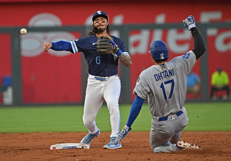 Jun 27, 2025; Kansas City, Missouri, USA;  Kansas City Royals second baseman Jonathan India (6) throws to first base after forcing out Los Angeles Dodgers designated hitter Shohei Ohtani (17) at second base in the third inning at Kauffman Stadium. Mandatory Credit: Peter Aiken-Imagn Images