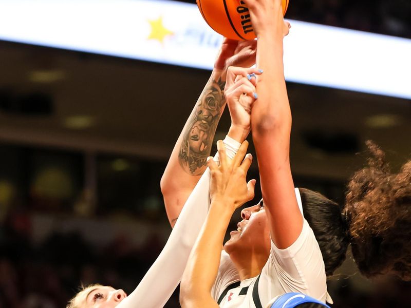 Jan 15, 2024; Columbia, South Carolina, USA; South Carolina Gamecocks center Kamilla Cardoso (10) shoots over Kentucky Wildcats guard Amiya Jenkins (20) in the first half at Colonial Life Arena. Mandatory Credit: Jeff Blake-USA TODAY Sports