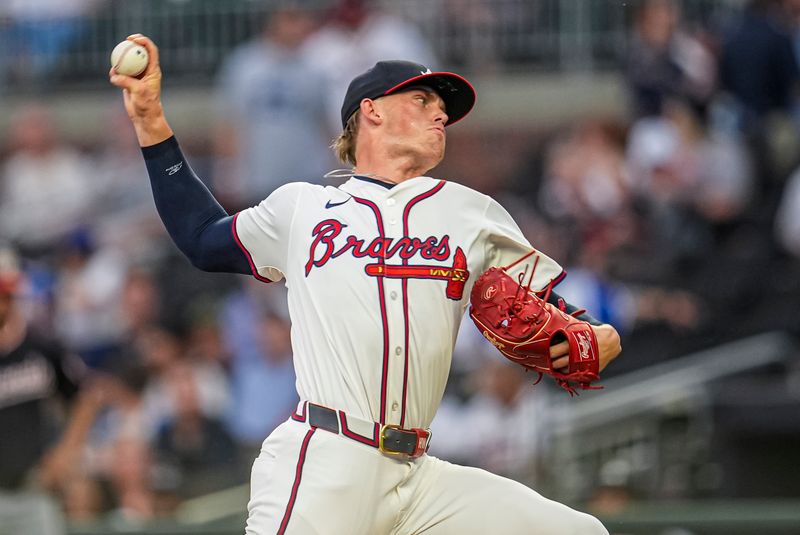 Sep 23, 2025; Cumberland, Georgia, USA; Atlanta Braves starting pitcher Hurston Waldrep (64) pitches against the Washington Nationals during the first inning at Truist Park. Mandatory Credit: Dale Zanine-Imagn Images