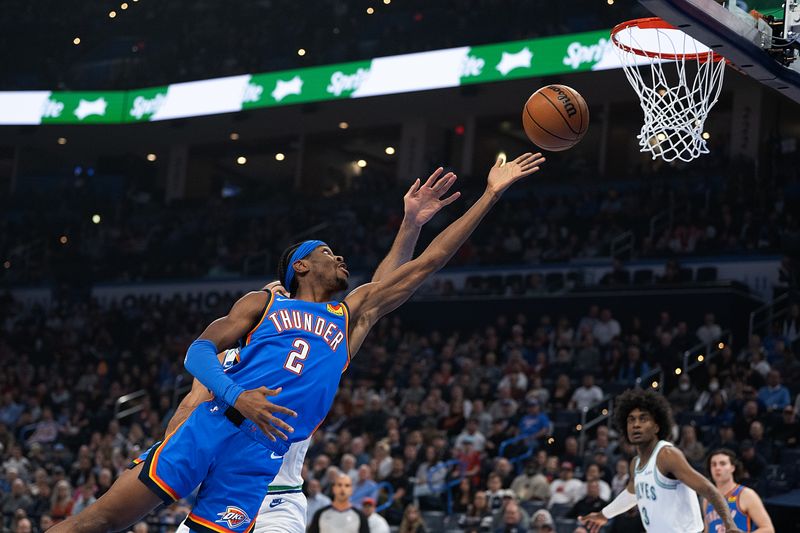 OKLAHOMA CITY, OKLAHOMA - JANUARY 29: Shai Gilgeous-Alexander #2 of the Oklahoma City Thunder puts up a shot at the rim during the first half against the Minnesota Timberwolves at Paycom Center on January 29, 2024 in Oklahoma City, Oklahoma. NOTE TO USER: User expressly acknowledges and agrees that, by downloading and or using this Photograph, user is consenting to the terms and conditions of the Getty Images License Agreement. (Photo by Joshua Gateley/Getty Images)