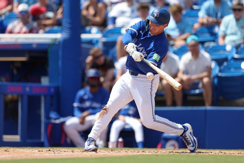 Mar 20, 2025; Dunedin, Florida, USA; Toronto Blue Jays third baseman Will Wagner (7) doubles against the Tampa Bay Rays in the second inning during spring training at TD Ballpark. Mandatory Credit: Nathan Ray Seebeck-Imagn Images
