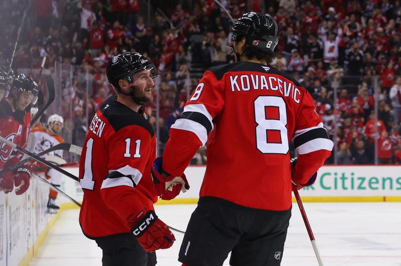 Oct 27, 2024; Newark, New Jersey, USA; New Jersey Devils right wing Stefan Noesen (11) celebrates a goal against the Anaheim Ducks during the second period at Prudential Center. Mandatory Credit: Ed Mulholland-Imagn Images