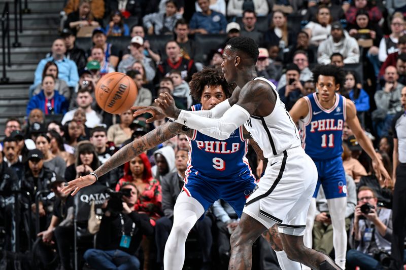 BROOKLYN, NY - MARCH 5:Dennis Schroder #17 of the Brooklyn Nets passes the ball during the game against the Philadelphia 76ers on March 5, 2024 at Barclays Center in Brooklyn, New York. NOTE TO USER: User expressly acknowledges and agrees that, by downloading and or using this Photograph, user is consenting to the terms and conditions of the Getty Images License Agreement. Mandatory Copyright Notice: Copyright 2024 NBAE (Photo by David Dow/NBAE via Getty Images)