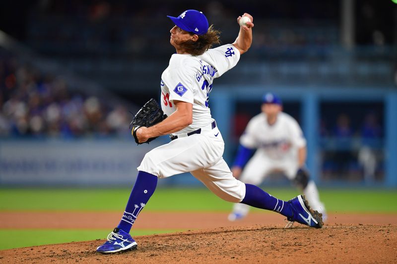 Apr 3, 2024; Los Angeles, California, USA; Los Angeles Dodgers starting pitcher Tyler Glasnow (31) throws against the San Francisco Giants during the sixth inning at Dodger Stadium. Mandatory Credit: Gary A. Vasquez-USA TODAY Sports