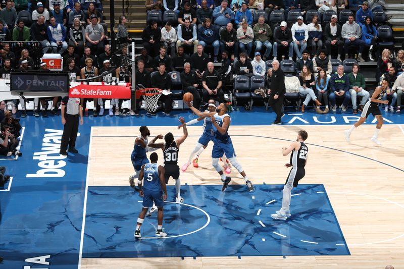 MINNEAPOLIS, MN -  FEBRUARY 27: Rudy Gobert #27 of the Minnesota Timberwolves drives to the basket during the game against the San Antonio Spurs on February 27, 2024 at Target Center in Minneapolis, Minnesota. NOTE TO USER: User expressly acknowledges and agrees that, by downloading and or using this Photograph, user is consenting to the terms and conditions of the Getty Images License Agreement. Mandatory Copyright Notice: Copyright 2024 NBAE (Photo by David Sherman/NBAE via Getty Images)