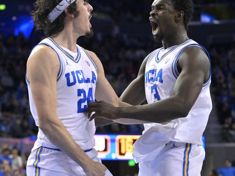 Feb 16, 2023; Los Angeles, California, USA; UCLA Bruins guard Jaime Jaquez Jr. (24) and forward Adem Bona (3) celebrate after a basket in the second half against the Stanford Cardinal at Pauley Pavilion presented by Wescom. Mandatory Credit: Jayne Kamin-Oncea-USA TODAY Sports