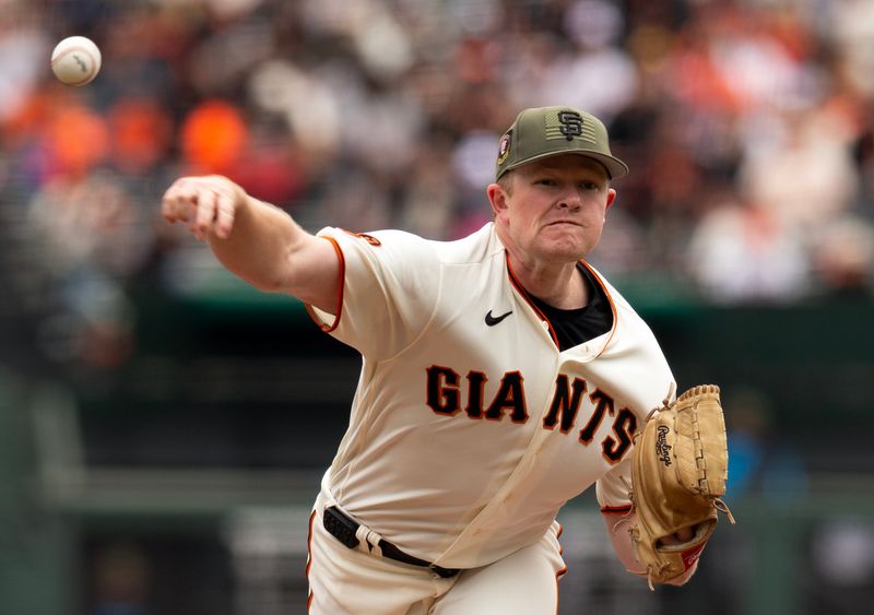 May 20, 2023; San Francisco, California, USA; San Francisco Giants starting pitcher Logan Webb (62) delivers a pitch against the Miami Marlins during the first inning at Oracle Park. Mandatory Credit: D. Ross Cameron-USA TODAY Sports