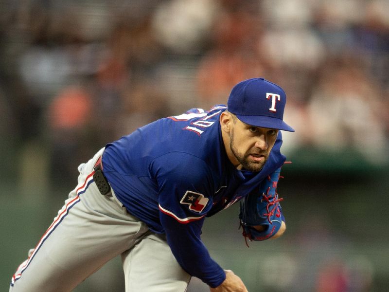 Apr 25, 2025; San Francisco, California, USA; Texas Rangers starting pitcher Nathan Eovaldi (17) delivers a pitch against the San Francisco Giants during the first inning at Oracle Park. Mandatory Credit: D. Ross Cameron-Imagn Images