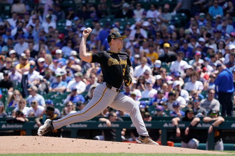 May 19, 2024; Chicago, Illinois, USA; Pittsburgh Pirates pitcher Mitch Keller (23) throws the ball against the Chicago Cubs during the first inning at Wrigley Field. Mandatory Credit: David Banks-USA TODAY Sports