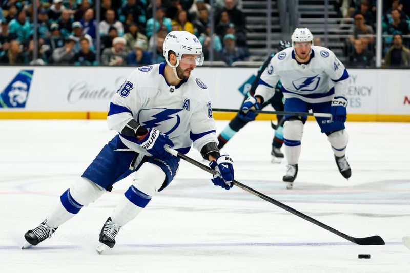 Dec 9, 2023; Seattle, Washington, USA; Tampa Bay Lightning right wing Nikita Kucherov (86) skates with the puck against the Seattle Kraken during the third period at Climate Pledge Arena. Mandatory Credit: Joe Nicholson-USA TODAY Sports