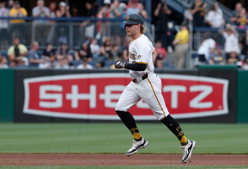 Jul 2, 2024; Pittsburgh, Pennsylvania, USA;  Pittsburgh Pirates center fielder Jack Suwinski (65) circles the bases on a two run home run against the St. Louis Cardinals during the fifth inning at PNC Park. Mandatory Credit: Charles LeClaire-USA TODAY Sports