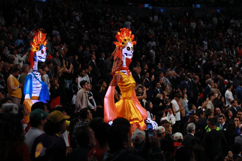 MEXICO CITY, MEXICO - NOVEMBER 02: The 'Catrinas' as part of the 'Day of the Dead' perform before the game between Miami Heat and the Washington Wizards at Arena Ciudad de Mexico on November 02, 2024 in Mexico City, Mexico. NOTE TO USER: User expressly acknowledges and agrees that, by downloading and or using this photograph, User is consenting to the terms and conditions of the Getty Images License Agreement. (Photo by Manuel Velasquez/Getty Images)