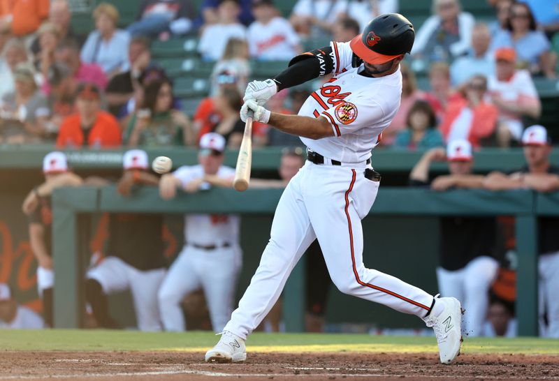 Mar 24, 2023; Sarasota, Florida, USA; Baltimore Orioles second baseman Terrin Vavra (77) singles against the New York Yankees during the second inning at Ed Smith Stadium. Mandatory Credit: Kim Klement-USA TODAY Sports