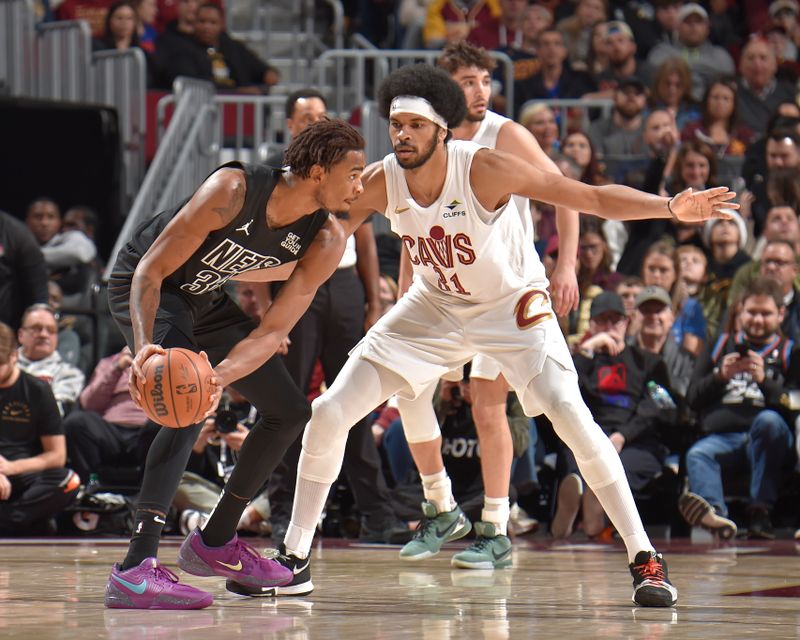 CLEVELAND, OH - NOVEMBER 9: Jarrett Allen #31 of the Cleveland Cavaliers plays defense during the game against the Brooklyn Nets on November 9, 2024 at Rocket Mortgage FieldHouse in Cleveland, Ohio. NOTE TO USER: User expressly acknowledges and agrees that, by downloading and/or using this Photograph, user is consenting to the terms and conditions of the Getty Images License Agreement. Mandatory Copyright Notice: Copyright 2024 NBAE (Photo by David Liam Kyle/NBAE via Getty Images)