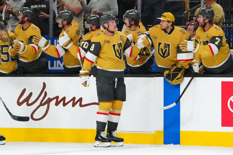 Oct 11, 2024; Las Vegas, Nevada, USA; Vegas Golden Knights center Jack Eichel (9) celebrates with team mates after scoring a goal against the St. Louis Blues during the first period at T-Mobile Arena. Mandatory Credit: Stephen R. Sylvanie-Imagn Images