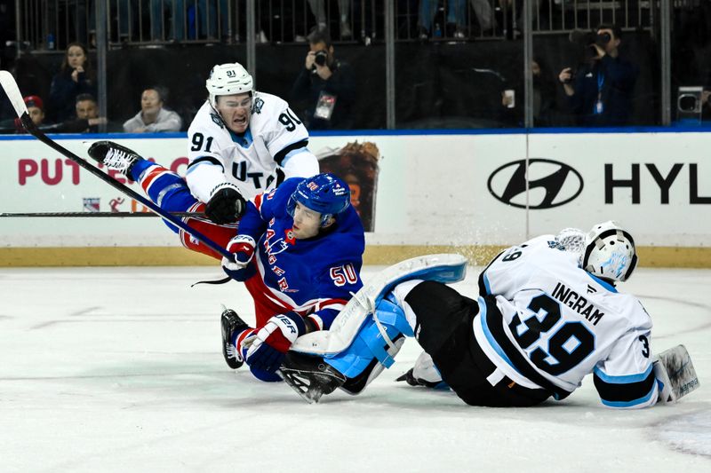 Oct 12, 2024; New York, New York, USA; Utah Hockey Club right wing Josh Doan (91) checks New York Rangers left wing Will Cuylle (50) during the second period at Madison Square Garden. Mandatory Credit: John Jones-Imagn Images