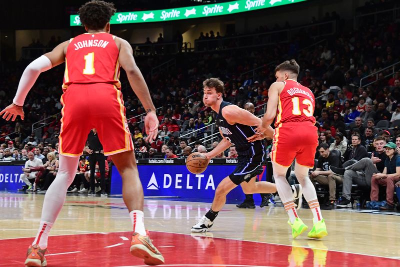 ATLANTA, GA - FEBRUARY 25: Franz Wagner #22 of the Orlando Magic drives to the basket during the game against the Atlanta Hawks on February 25, 2024 at State Farm Arena in Atlanta, Georgia.  NOTE TO USER: User expressly acknowledges and agrees that, by downloading and/or using this Photograph, user is consenting to the terms and conditions of the Getty Images License Agreement. Mandatory Copyright Notice: Copyright 2024 NBAE (Photo by Scott Cunningham/NBAE via Getty Images)