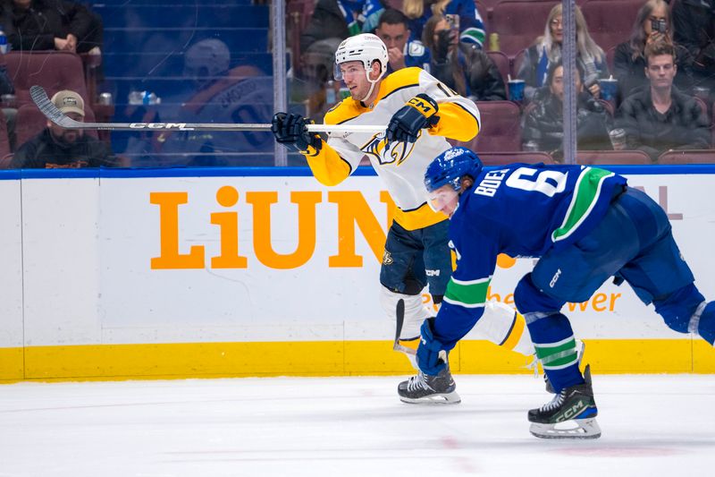 Jan 3, 2025; Vancouver, British Columbia, CAN; Vancouver Canucks forward Brock Boeser (6) watches as Nashville Predators forward Colton Sissons (10) scores in the third period at Rogers Arena. Mandatory Credit: Bob Frid-Imagn Images