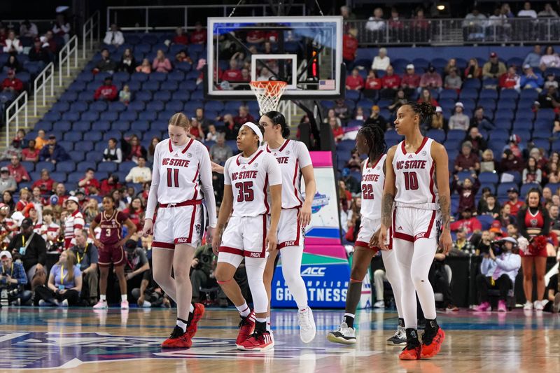 Mar 9, 2024; Greensboro, NC, USA; NC State Wolfpack forward Maddie Cox (11), guard Zoe Brooks (35), guard Aziaha James (10), forward Mimi Collins (2) and guard Saniya Rivers (22) enter the court during the second half at Greensboro Coliseum. Mandatory Credit: David Yeazell-USA TODAY Sports