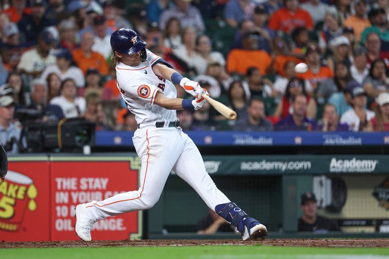 Jul 4, 2023; Houston, Texas, USA; Houston Astros shortstop Grae Kessinger (16) hits a home run during the third inning against the Colorado Rockies at Minute Maid Park. Mandatory Credit: Troy Taormina-USA TODAY Sports