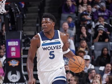 SACRAMENTO, CA - DECEMBER 23: Anthony Edwards #5 of the Minnesota Timberwolves brings the ball up court against the Sacramento Kings on December 23, 2023 at Golden 1 Center in Sacramento, California. NOTE TO USER: User expressly acknowledges and agrees that, by downloading and or using this Photograph, user is consenting to the terms and conditions of the Getty Images License Agreement. Mandatory Copyright Notice: Copyright 2023 NBAE (Photo by Rocky Widner/NBAE via Getty Images)