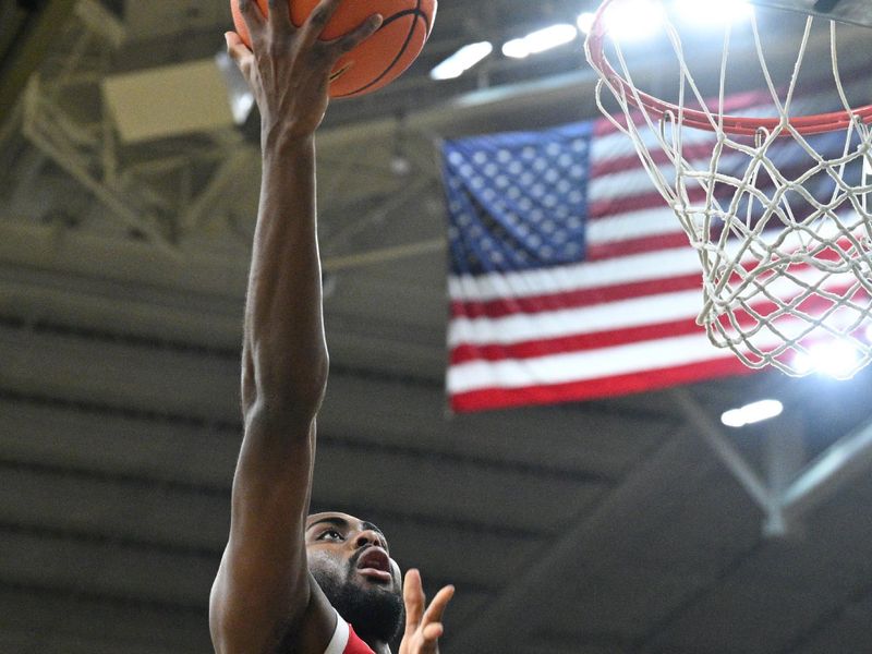 Iowa Hawkeyes' Tony Perkins Shines as Team Prepares to Face Ohio State Buckeyes at Target Center