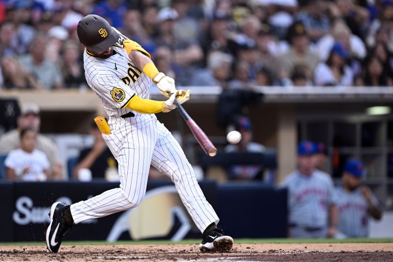 Aug 24, 2024; San Diego, California, USA; San Diego Padres shortstop Mason McCoy (18) hits a single against the New York Mets during the fifth inning at Petco Park. Mandatory Credit: Orlando Ramirez-USA TODAY Sports