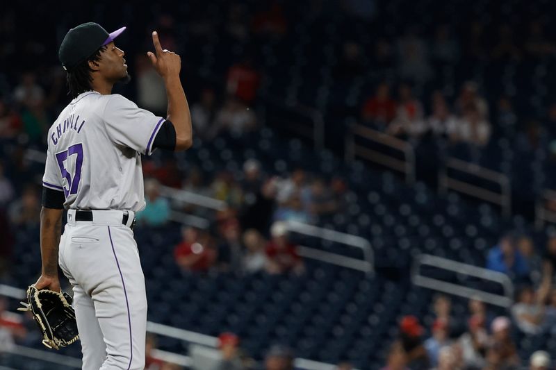 Aug 20, 2024; Washington, District of Columbia, USA; Colorado Rockies pitcher Angel Chivilli (57) celebrates after the final out against the Washington Nationals during the ninth inning at Nationals Park. Mandatory Credit: Geoff Burke-USA TODAY Sports