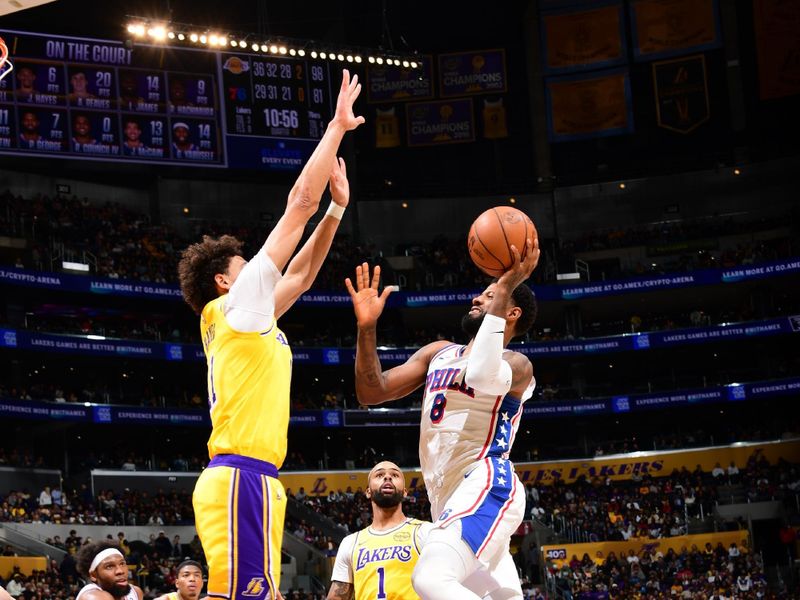 LOS ANGELES, CA - NOVEMBER 8: Paul George #8 of the Philadelphia 76ers shoots the ball during the game against the Los Angeles Lakers on Novemberr 8, 2024 at Crypto.Com Arena in Los Angeles, California. NOTE TO USER: User expressly acknowledges and agrees that, by downloading and/or using this Photograph, user is consenting to the terms and conditions of the Getty Images License Agreement. Mandatory Copyright Notice: Copyright 2024 NBAE (Photo by Adam Pantozzi/NBAE via Getty Images)