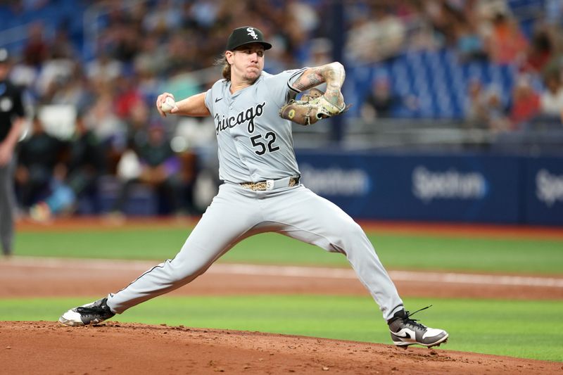 May 6, 2024; St. Petersburg, Florida, USA;  Chicago White Sox pitcher Mike Clevinger (52) throws a pitch against the Tampa Bay Rays in the first inning at Tropicana Field. Mandatory Credit: Nathan Ray Seebeck-USA TODAY Sports