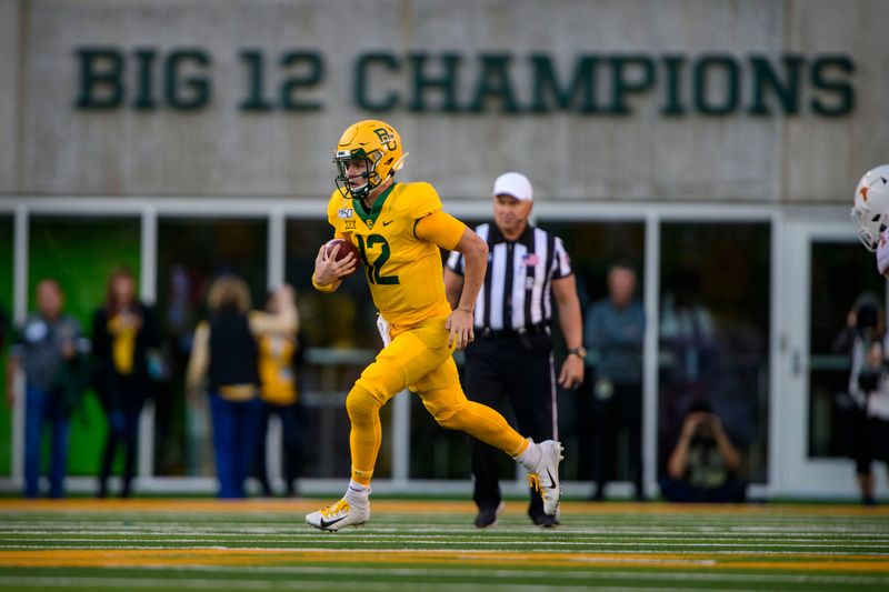 Nov 23, 2019; Waco, TX, USA; Baylor Bears quarterback Charlie Brewer (12) runs with the ball against the Texas Longhorns during the game at McLane Stadium. Mandatory Credit: Jerome Miron-USA TODAY Sports