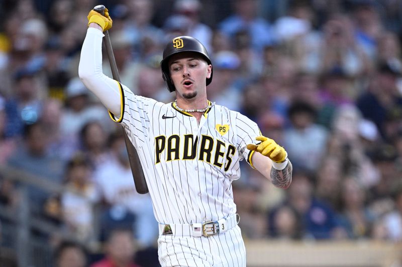 Aug 12, 2024; San Diego, California, USA; San Diego Padres center fielder Jackson Merrill (3) reacts after striking out during the second inning against the Pittsburgh Pirates at Petco Park. Mandatory Credit: Orlando Ramirez-USA TODAY Sports