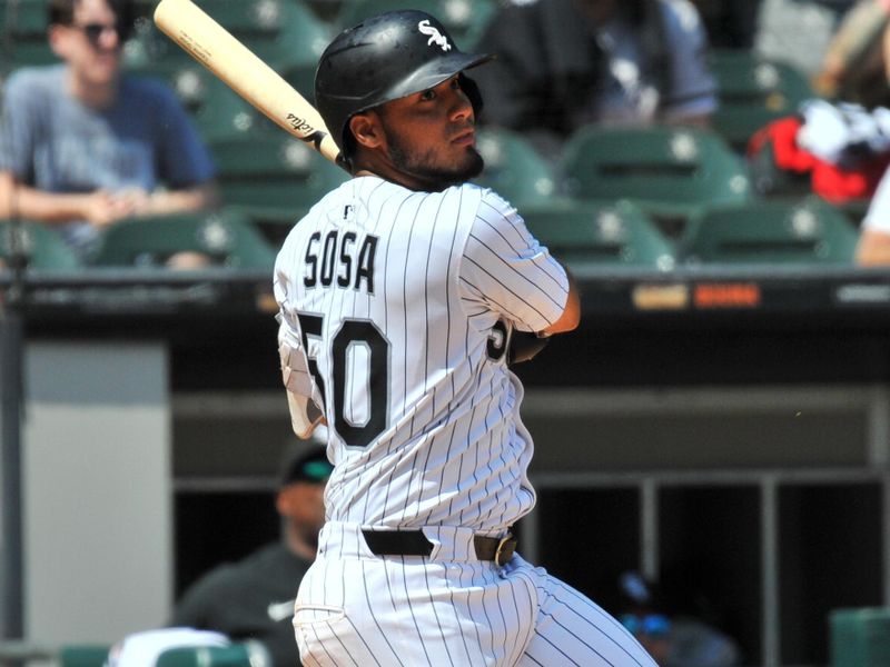 Jun 25, 2025; Chicago, Illinois, USA; Chicago White Sox second baseman Lenyn Sosa (50) watches his RBI single during the sixth inning against the Arizona Diamondbacks at Rate Field. Mandatory Credit: Patrick Gorski-Imagn Images
