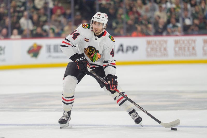 Mar 19, 2026; Saint Paul, Minnesota, USA; Chicago Blackhawks defenseman Wyatt Kaiser (44) shoots from the blue line against the Minnesota Wild in the first period at Grand Casino Arena. Mandatory Credit: Matt Blewett-Imagn Images Mar 19, 2026; Saint Paul, Minnesota, USA; Chicago Blackhawks defenseman Wyatt Kaiser (44) shoots from the blue line against the Minnesota Wild in the first period at Grand Casino Arena. Mandatory Credit: Matt Blewett-Imagn Images
