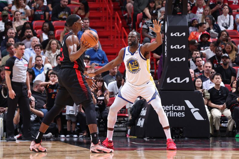 MIAMI, FL - MARCH 26:  Draymond Green #23 of the Golden State Warriors plays defense during the game against the Miami Heat on March 26, 2024 at Kaseya Center in Miami, Florida. NOTE TO USER: User expressly acknowledges and agrees that, by downloading and or using this Photograph, user is consenting to the terms and conditions of the Getty Images License Agreement. Mandatory Copyright Notice: Copyright 2024 NBAE (Photo by Jeff Haynes/NBAE via Getty Images)