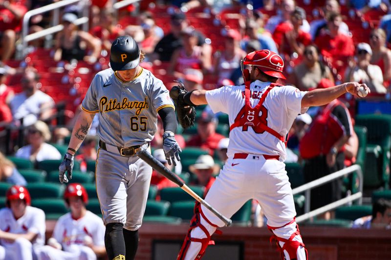 Jun 13, 2024; St. Louis, Missouri, USA;  Pittsburgh Pirates left fielder Jack Suwinski (65) throws his bat to the ground after striking out to end the eighth inning against the St. Louis Cardinals at Busch Stadium. Mandatory Credit: Jeff Curry-USA TODAY Sports