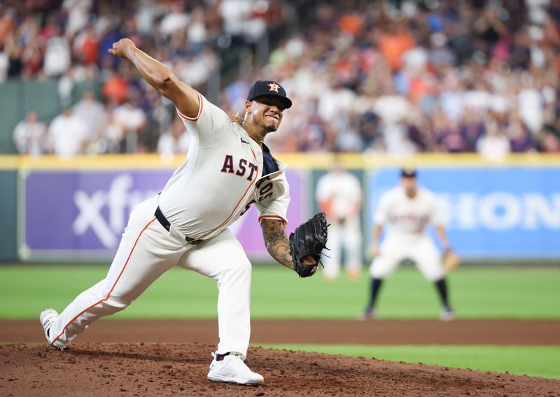 Apr 13, 2024; Houston, Texas, USA;  Houston Astros pitcher Bryan Abreu (52) pitches against the Texas Rangers in the seventh inning at Minute Maid Park. Mandatory Credit: Thomas Shea-USA TODAY Sports